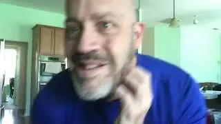 Rubbing and scratching my bald head!