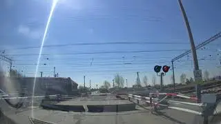 Железнодорожный переезд со шлагбаумом в Голышманово/Railway crossing with barrier in Golyshmanovo