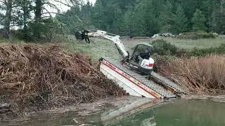 Removing Cattails and Bulrush from a 80 acres Lake Video