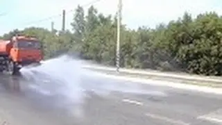 Вода на горячий асфальт
