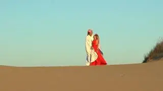 Lady in red and bedouin