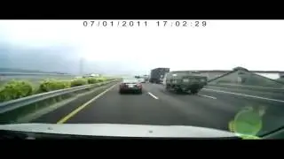 Truck smashed Toyota Corolla against highway divider