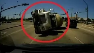 Cement Truck Flips Over, Crashes Into Minivan