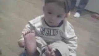 Rowan Rides in his Walker