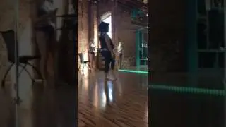 Pregnant pole dancer