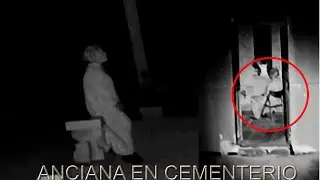 ANCIANA EN EL CEMENTERIO