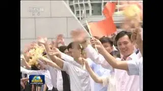 Cheering crowds welcome Xi Jinping to North Korea for the first time