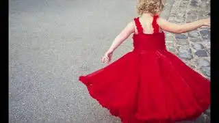 Girl Spinning in Red Dress