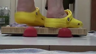 BOSS MEN CRUSHED FLAT UNDER A WOODEN BOARD WITH MY YELLOW CROCS