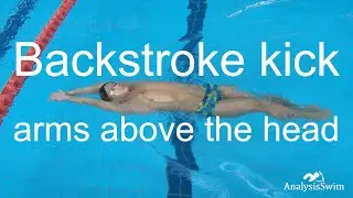 Backstroke kick arms above the head