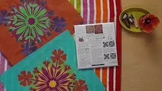 Watch the Double Hula Flower Applique Quilt Kit Unfold, Twice.