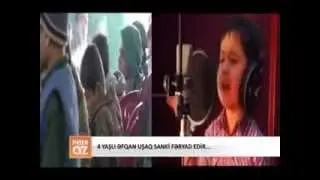 4 yaşlı əfqan uşaq sanki fəryad edir