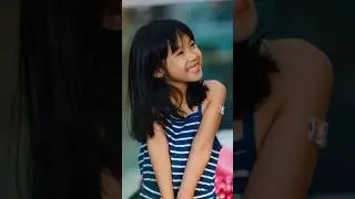 Taking pictures of a beautiful little girl