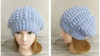 Women's beret hat with knitting needles in a houndstooth pattern