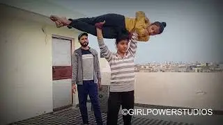 Small girl overhead lift and carry