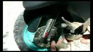 How to replace the front disc brake pads on a Yamaha scooter