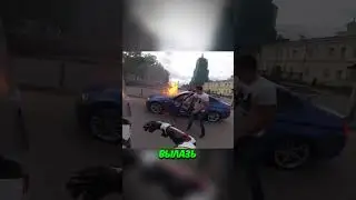 Biker catches a BMW catching fire right at a traffic light! 🏍️🚘