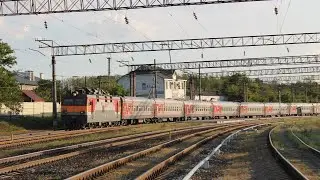 Электровоз ЭП1-051 с поездом №110А Санкт-Петербург-Астрахань и приветливая бригада на ст.Жасминная