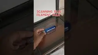scanning a blue filament bulb 