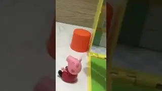 Peppa pig slides down the slide!