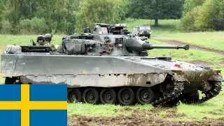 Sweden. Strv 122 tanks, Strf 90 combat vehicles and US Marines in training.