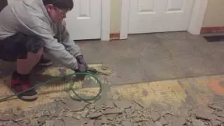 Pneumatic Chisel Destroying Tile