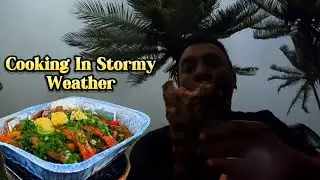 Cooking Roasted Red Snapper, Potatoes, And Mushrooms On A Stormy Day At The Beach