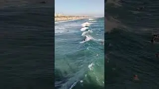 Watching the Surfers at Surf City USA! Huntington Beach! 🌊