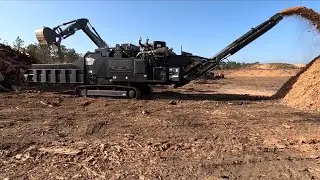 1,200 hp and 92,000 lbs eating stumps and trees
