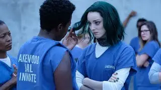 The woman is a mutant with superpowers and they don't realize the danger