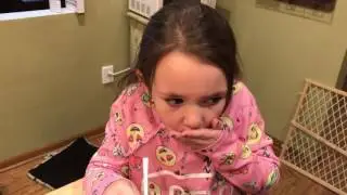 Mia gagging on antibiotic