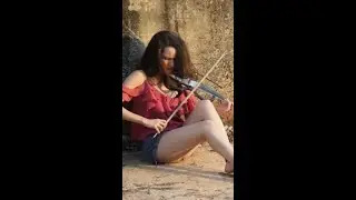 Electric violin in a Zambian River 