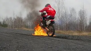 Idiot Drives Through Fire on Dirt Bike