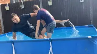 Dad vs son pool wrestling match making the most of the summer