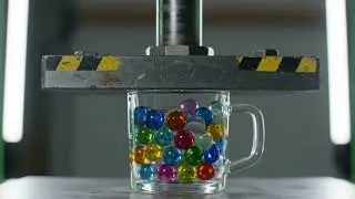 Crushing 1000 Lollipops With a Hydraulic Press