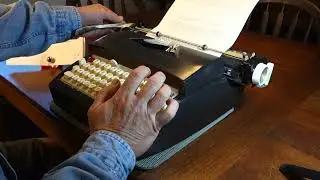 Sears Electric Twelve (5TE variant) typewriter at work