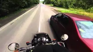 Мотоциклист против Рено Логан