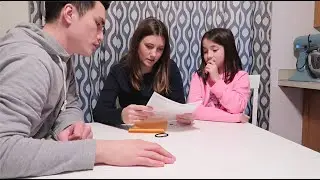 WHAT does her REPORT CARD say!?
