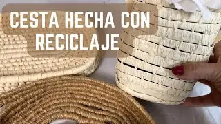CESTA HECHA CON RECICLAJE Y JARDÍN
