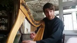 Playing harp in Corroy