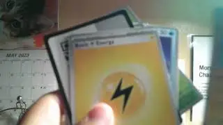 Opening the new Scarlet and Violet Pokemon Pack