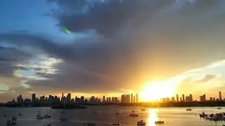Rainstorm and sunset over Miami