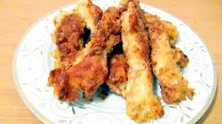 Homemade chicken strips in a pan Tender inside crunchy outside video recipe