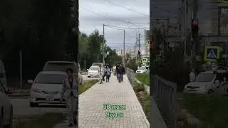 Летом осень наступила +15 облачно, люди в куртках в Якутске 30 июля.