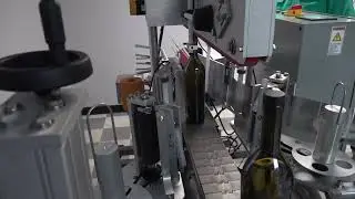 Labeler for Spirits Bottles on Both Round and Non-Round Bottles
