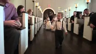 Katie, Laela and Levi walking down the isle