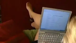 Blonde secretary sitting on sofa working tan pantyhose legs and feet dangling heels shoeplay 