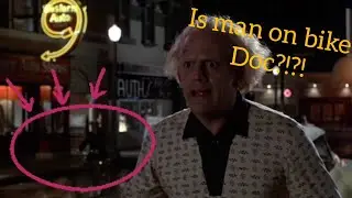 Is Doc on a bike in the background of Back to the future part 1 ?!?!?