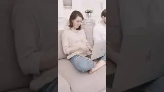 Woman Sitting on a Couch While #short#youtubeshortvi#bestshortvideo#papularshortvideo#treandingshort