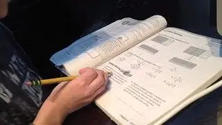 My son explaining his Common Core math HW